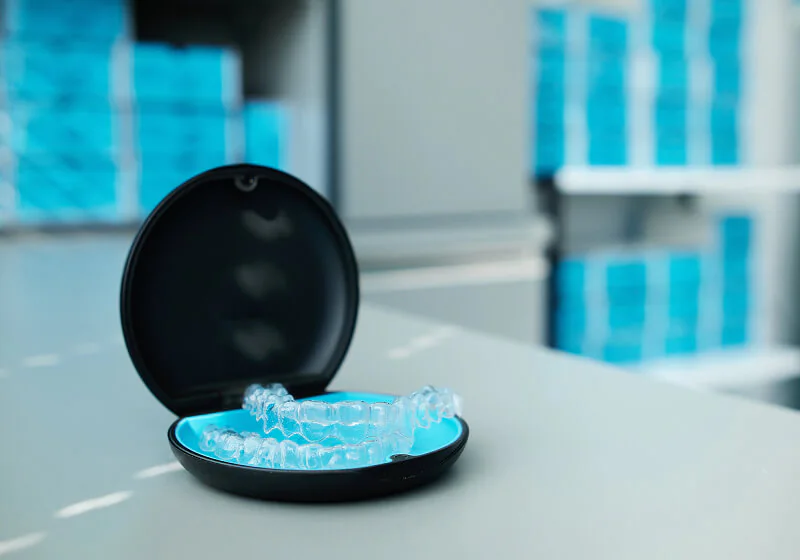 A tray of clear aligner as part of our orthodontic service options at Firoritto Family Dental in OH.